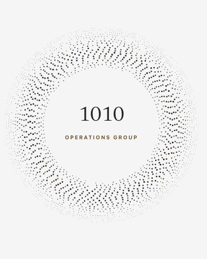 Centered text '1010' with 'OPERATIONS GROUP' below, surrounded by a dotted circular pattern.
