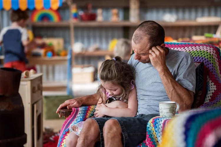 Jase reading with a child