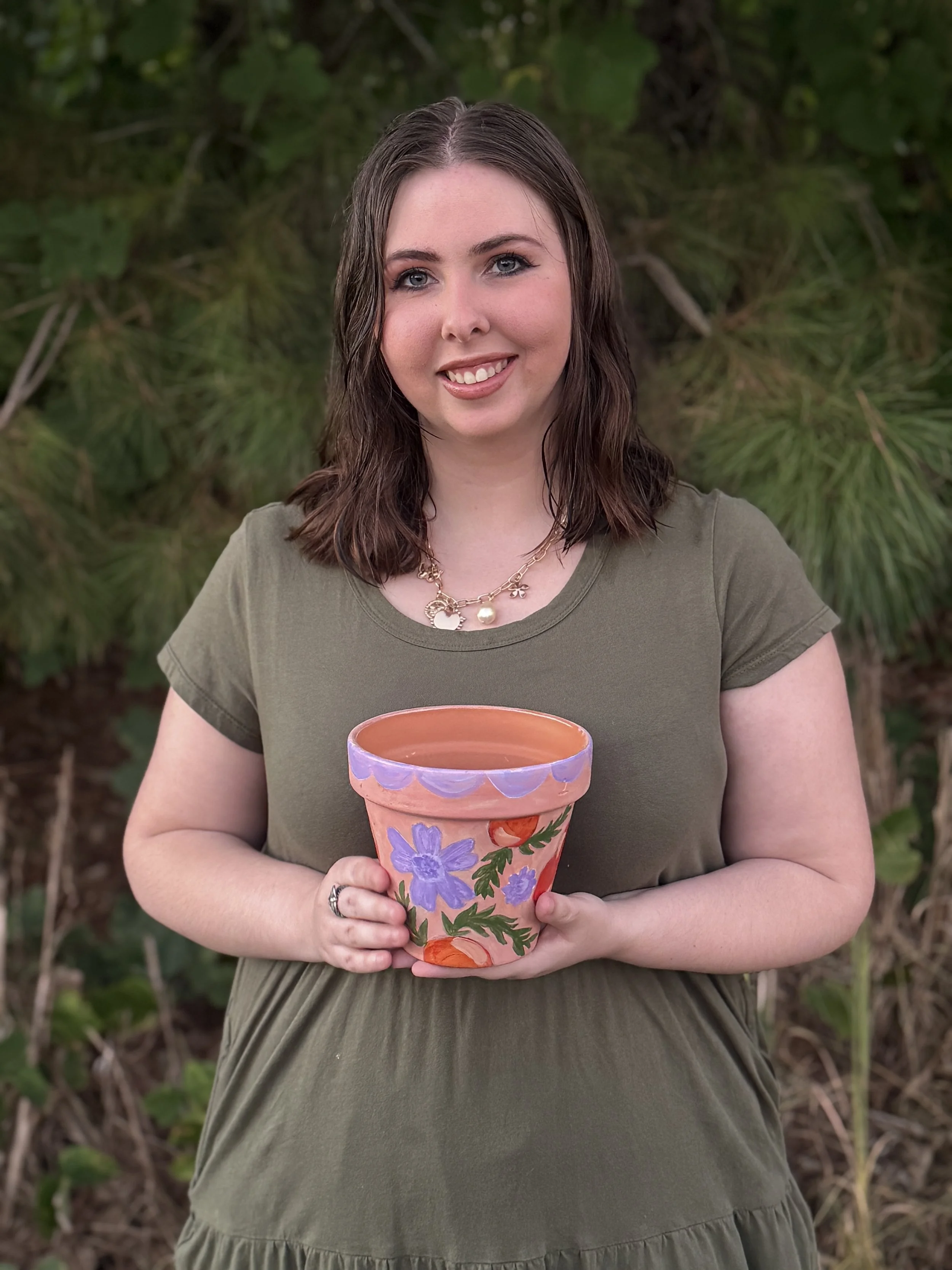 Purple flowers and oranges flower pot