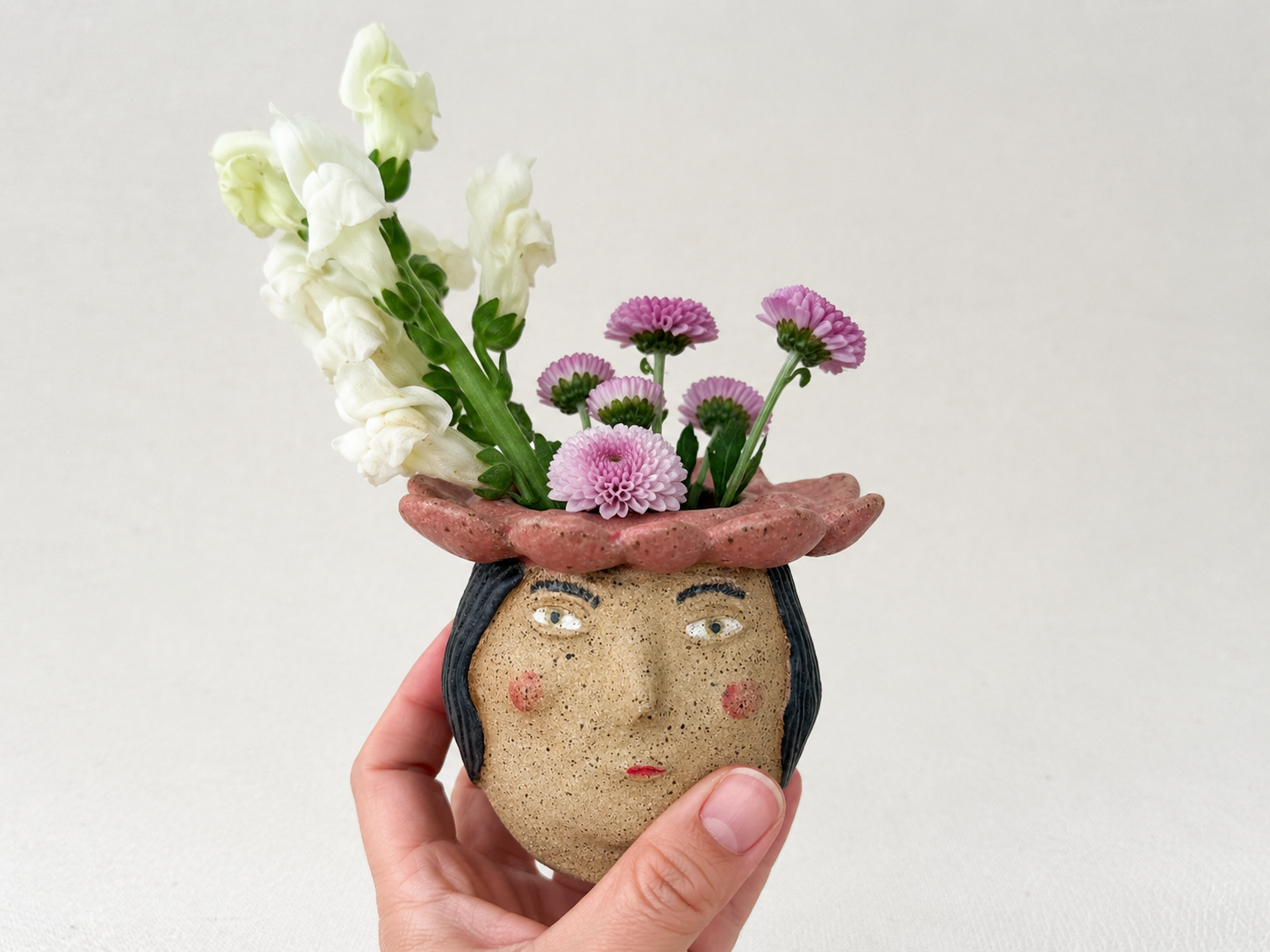 pink-pilgrim-front-flowers.png