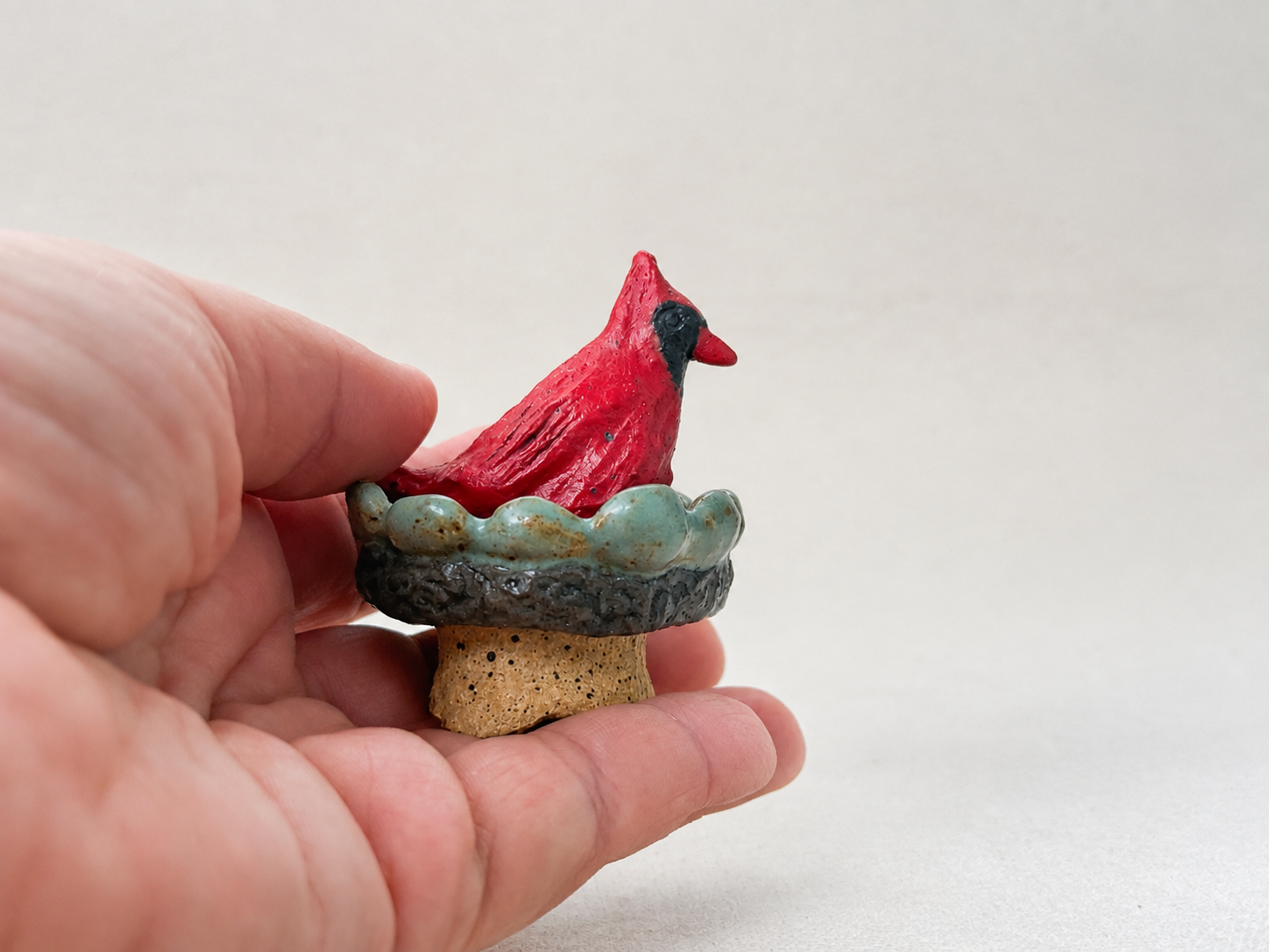 cardinal-in-hand.png