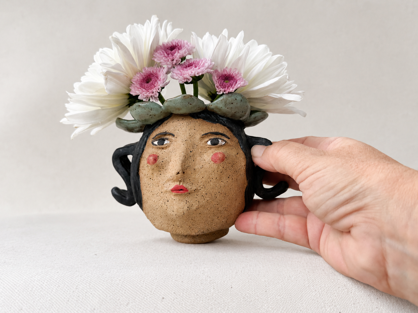 green-petal-lady-vase-hand.png