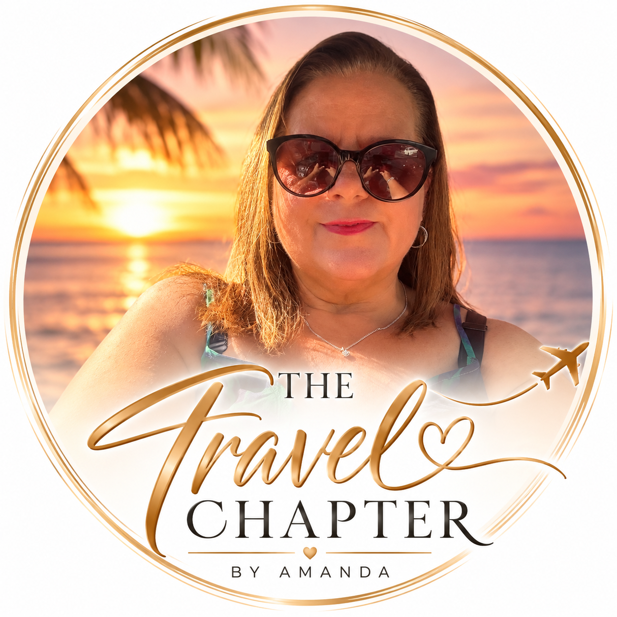 A woman wearing sunglasses smiling at sunset on a beach with palm trees in the background. The text overlay reads "The Travel Chapter by Amanda" with a small heart and airplane graphic.