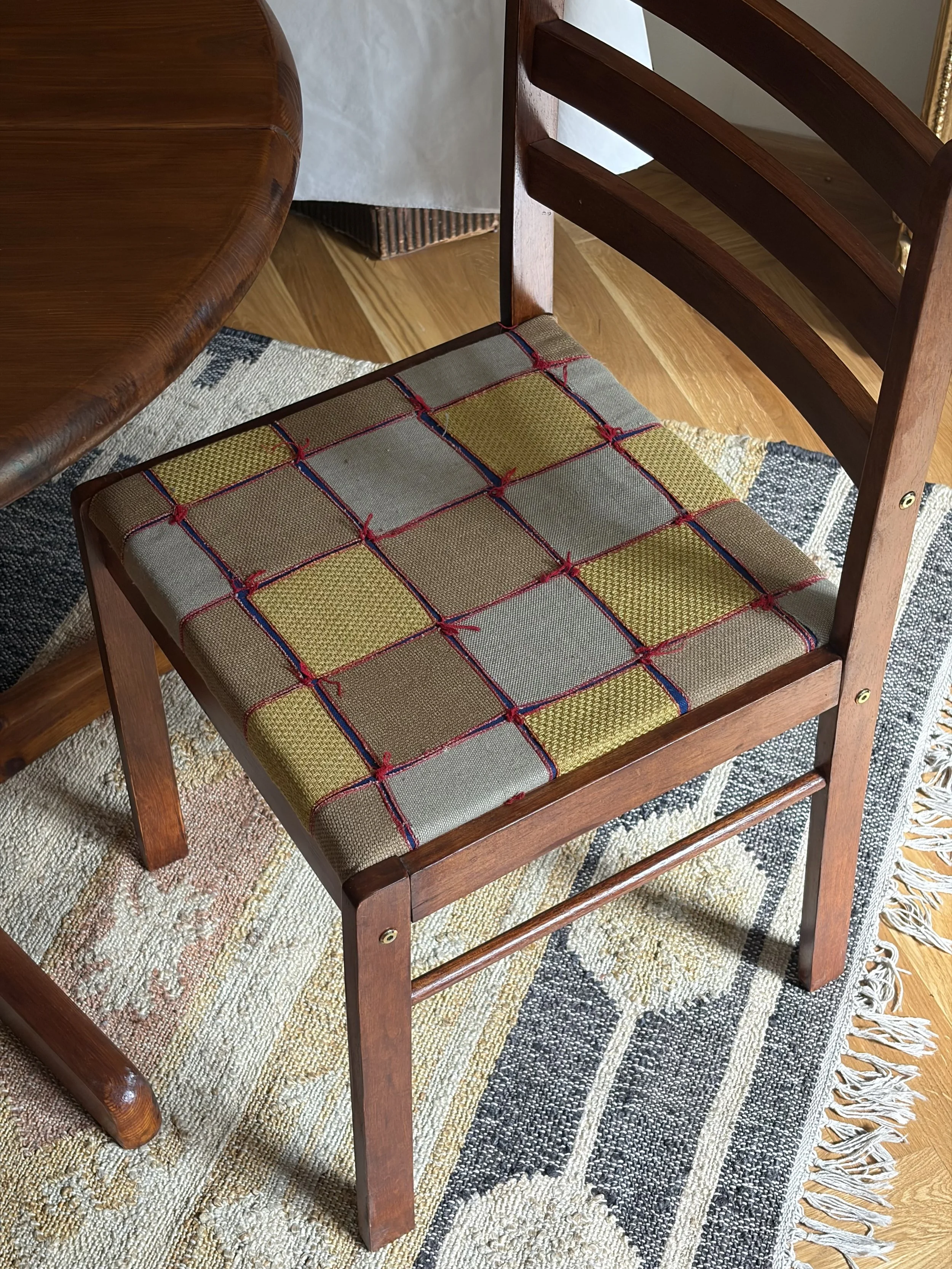 handmade upholstery on a restored wooden chair