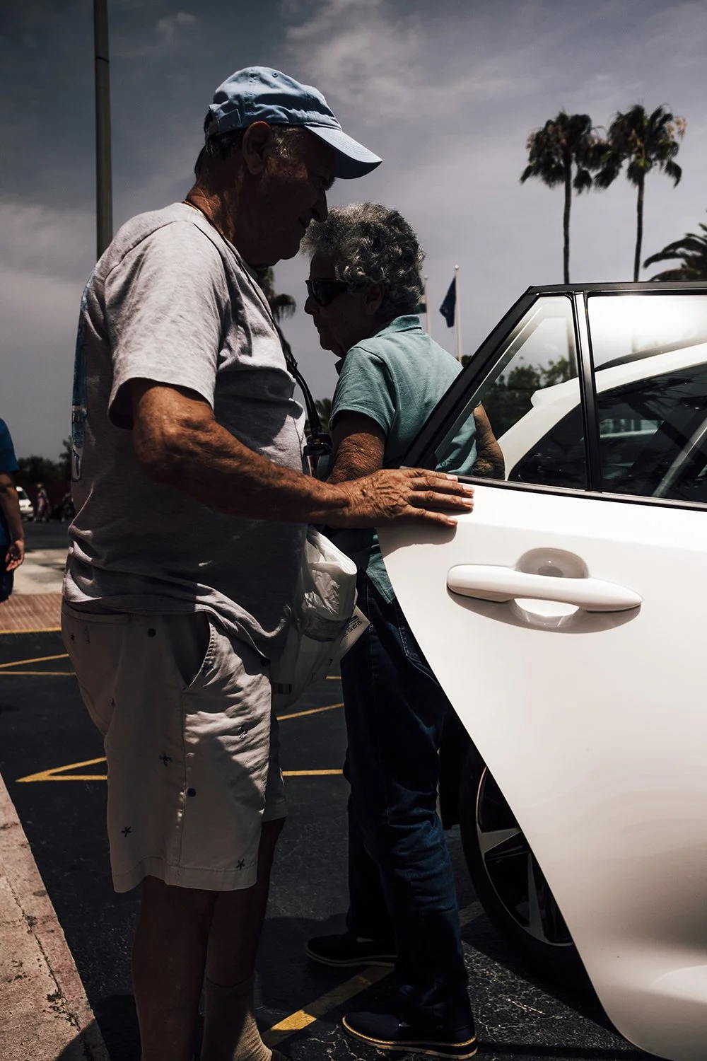 Man and Women are getting of from Taxi in Costa Del Sol Spain