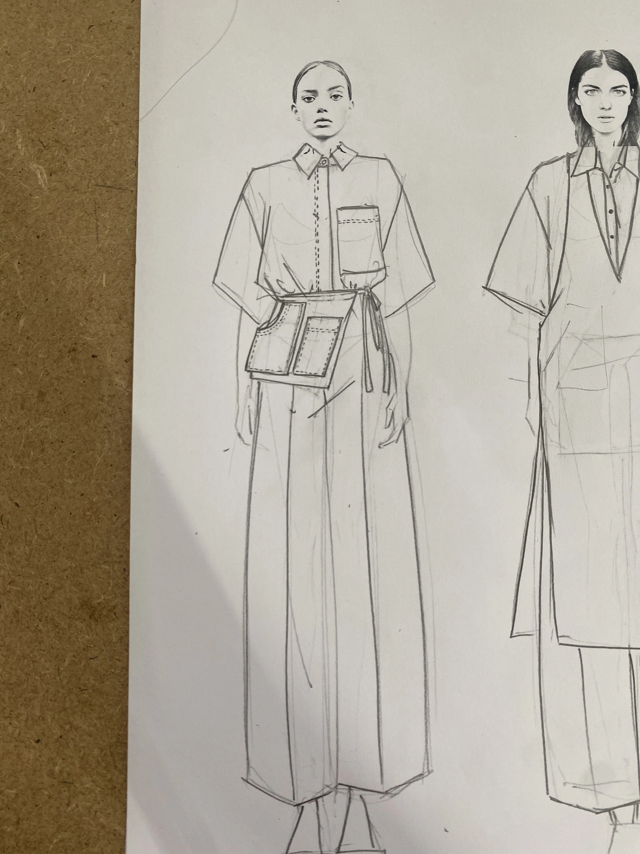 Dessin de deux femmes esquissées en ligne avec des vêtements.