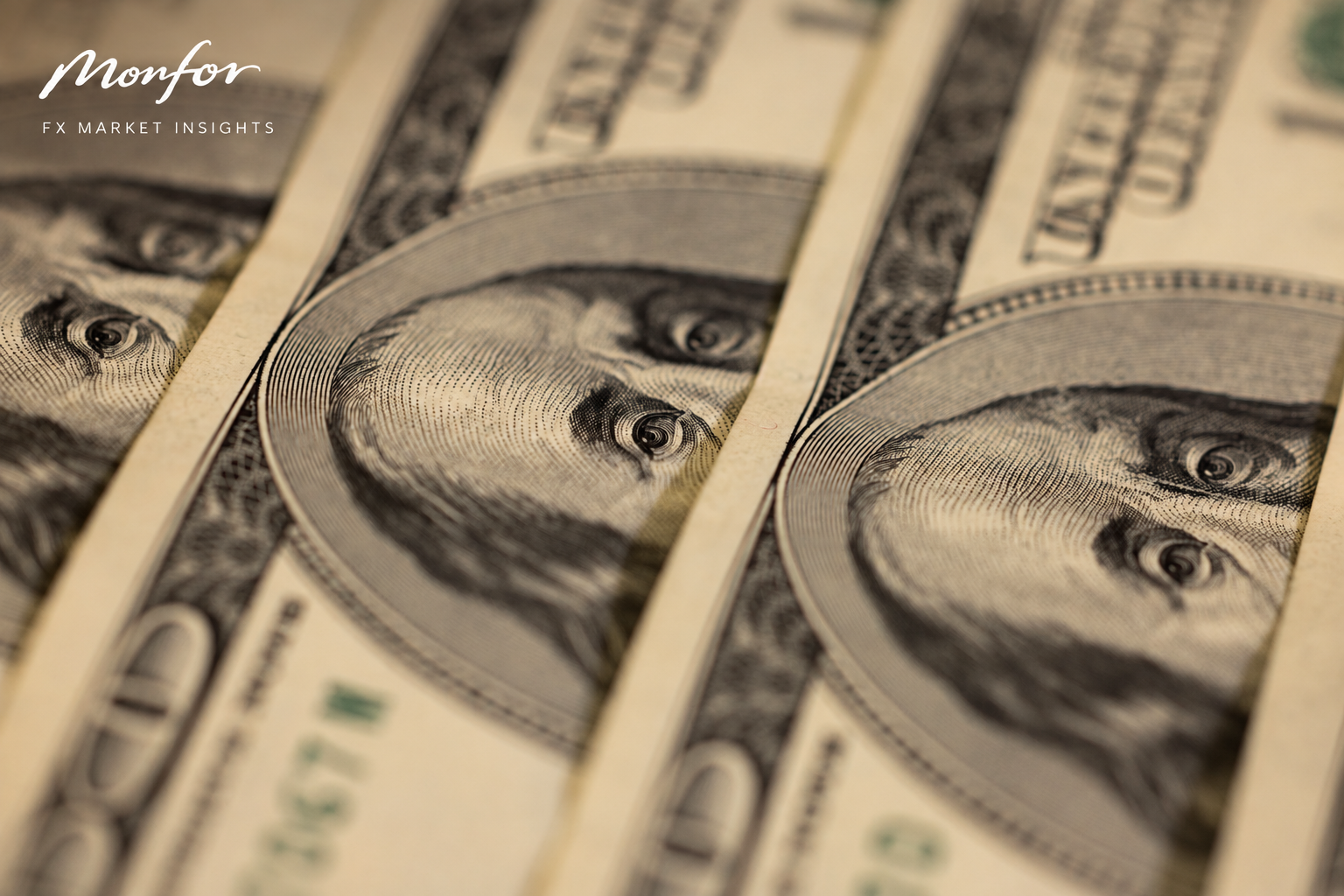 Close-up of US dollar banknotes featuring Benjamin Franklin, branded with the Monfor logo and “FX Market Insights”, representing currency markets, US dollar movements and foreign exchange analysis.