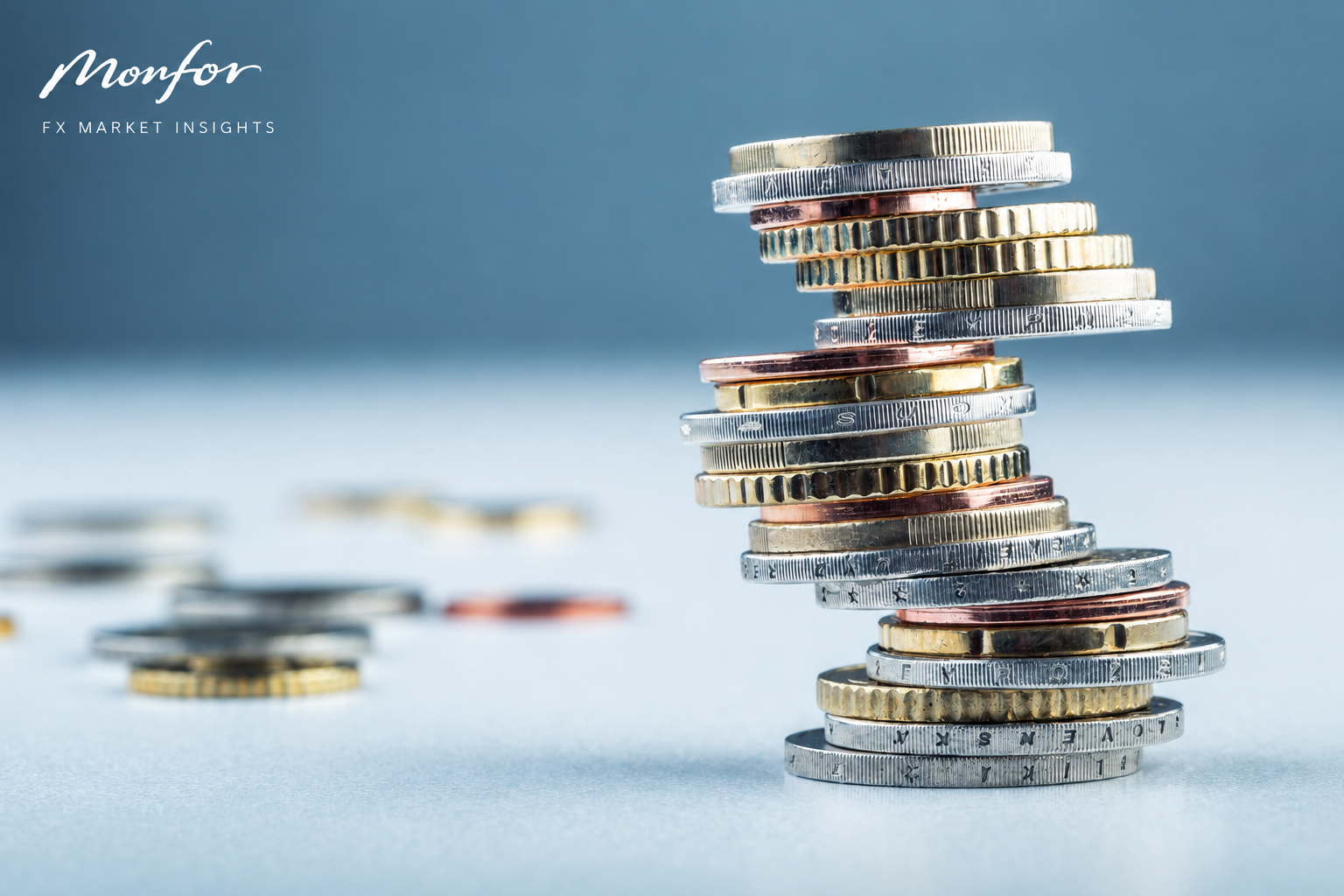 Monfor Market Insights featuring stacked global currency coins, reflecting foreign exchange markets, interest rates and currency risk.