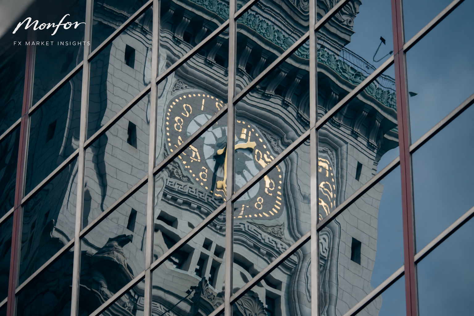 Reflected clock tower in modern glass architecture, capturing a sense of timing, uncertainty and shifting global markets for FX Market Insights by Monfor.