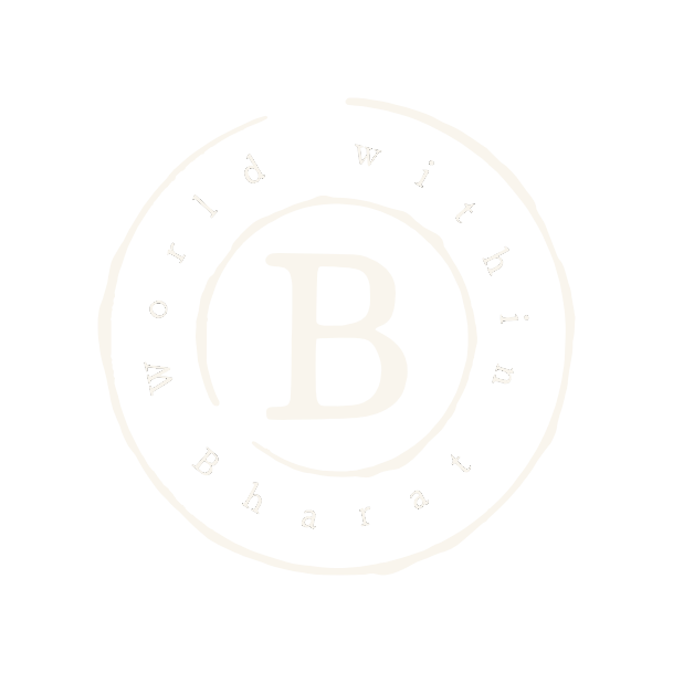 A black and white logo with a large letter 'B' in the center, surrounded by a circular text that reads 'with your Bharat' and 'Puri'.