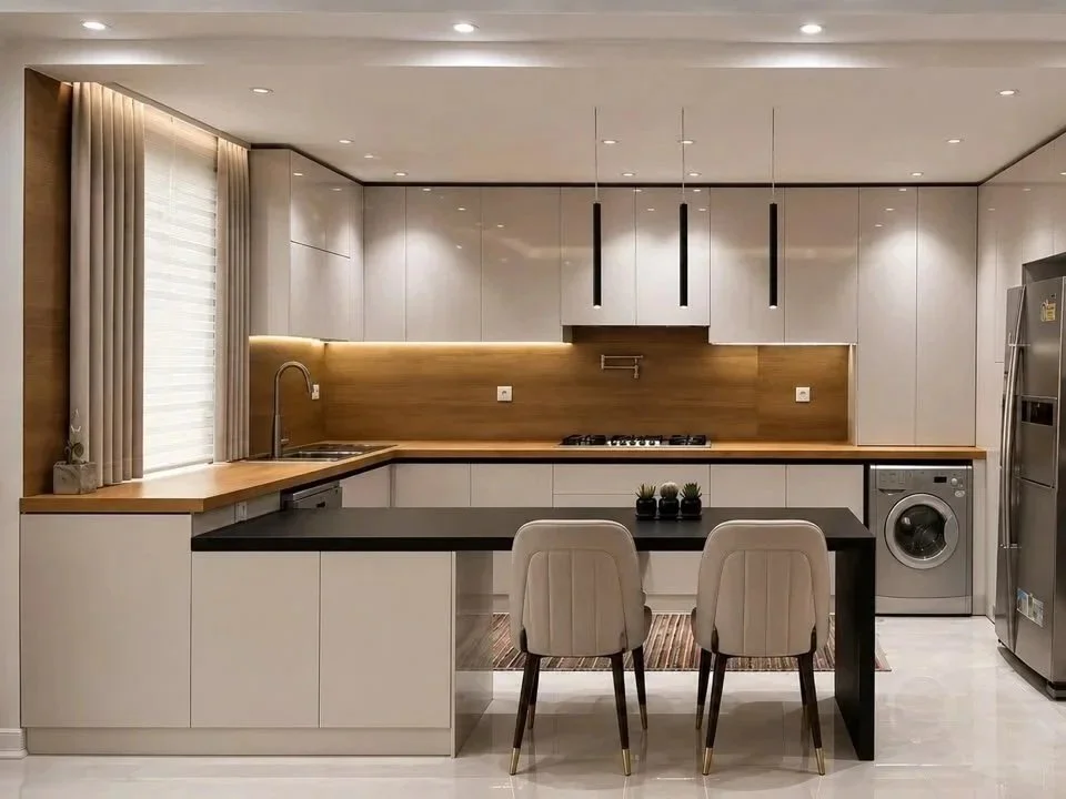 Luxury kitchen interior featuring custom millwork, modern materials, and a refined contemporary design aesthetic.