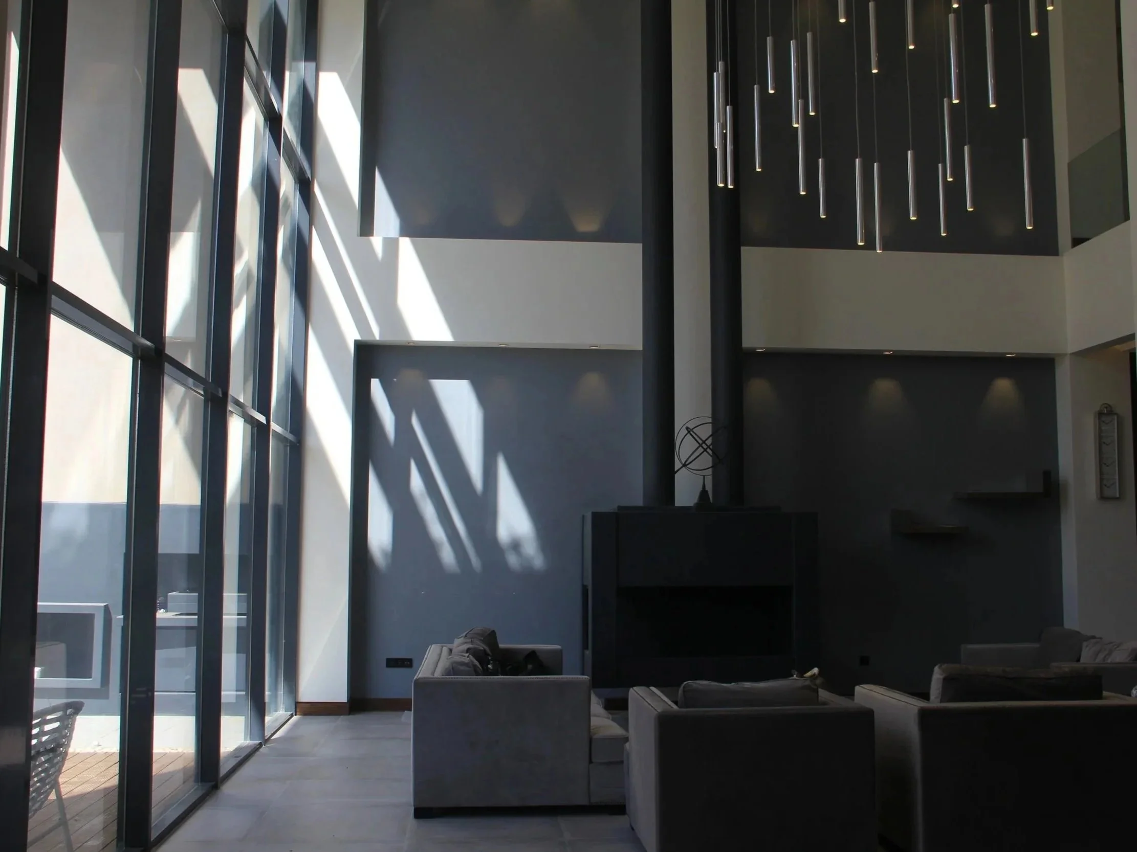 Contemporary commercial interior designed with expansive glazing, modern finishes, and an emphasis on natural light and spatial openness.