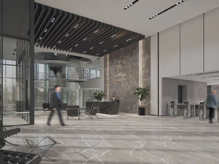 Contemporary corporate lobby featuring premium materials, double-height spaces, and an elegant hospitality-inspired arrival experience.