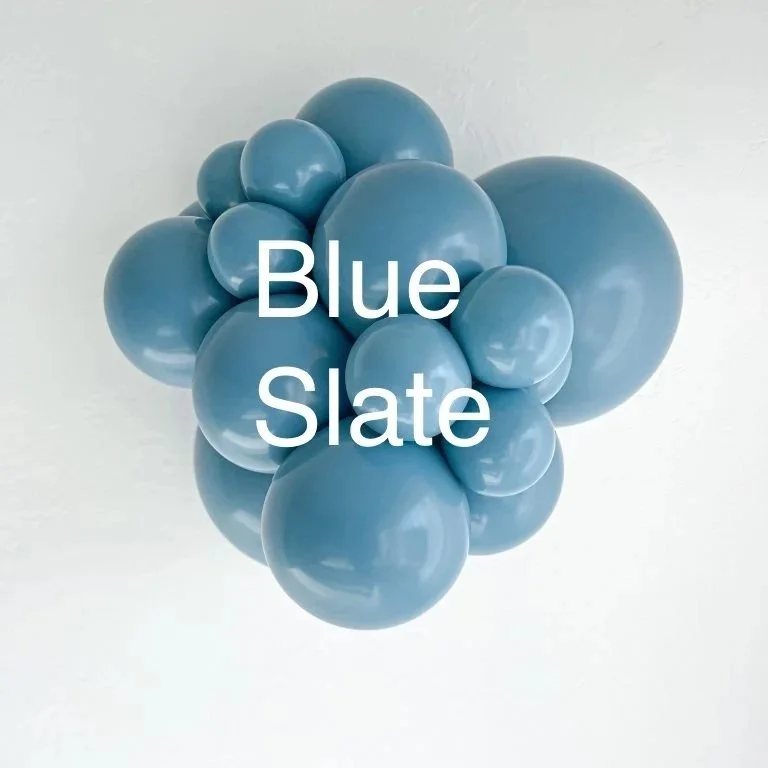 A cluster of blue balloons with the words 'Blue Slate' written over them.