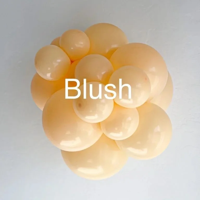 A cluster of shiny, light peach-colored bubbles or spheres with the word 'Blush' overlaid in white text.