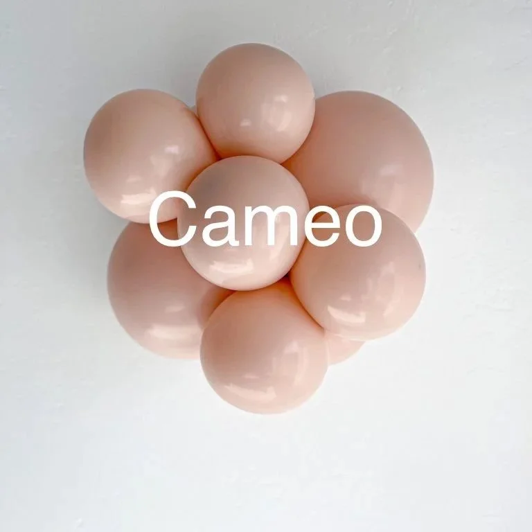 Six beige eggs arranged in a cluster with the word 'Cameo' overlayed in white text