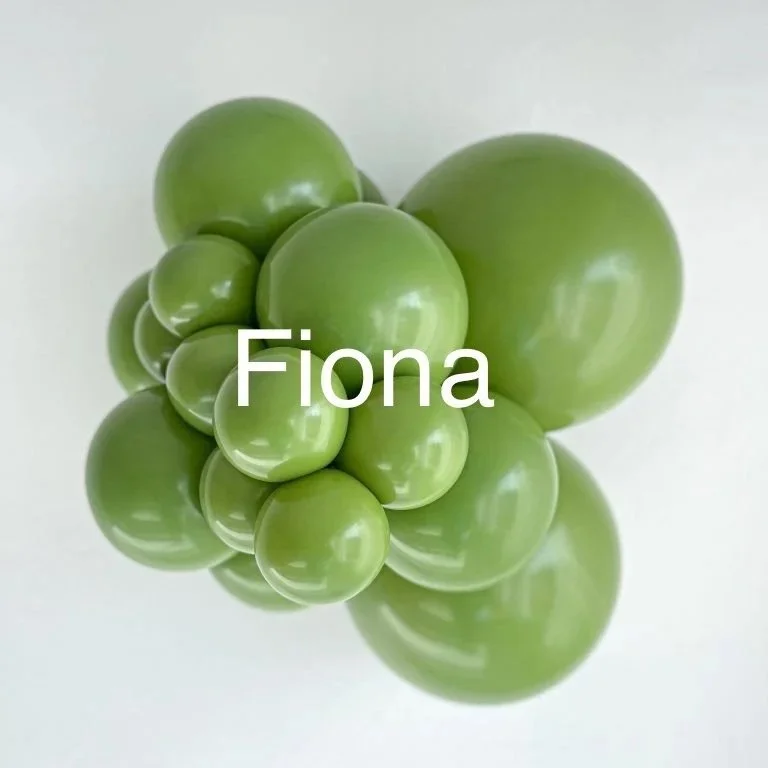 Cluster of shiny green grapes with the name 'Fiona' overlayed