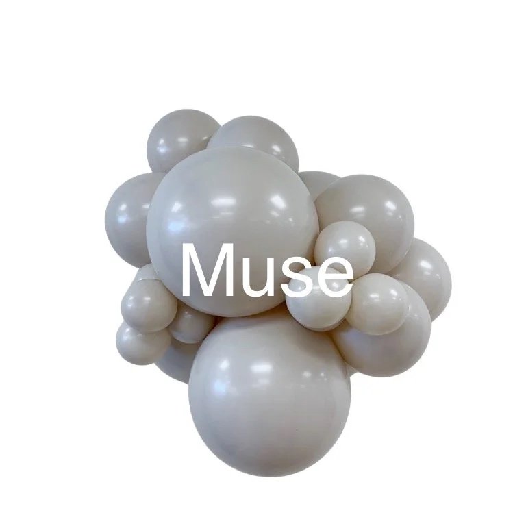 A cluster of white and cream-colored balloons of various sizes arranged in a spherical shape with the word 'Muse' overlaid.