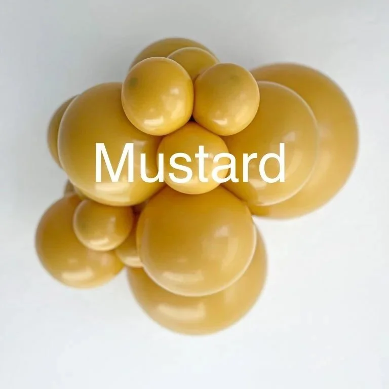 Close-up of yellow mustard-colored balloons with the word 'Mustard' overlayed in white text.