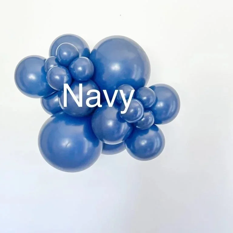 Cluster of blue balloons with the word "Navy" written in white in the center.