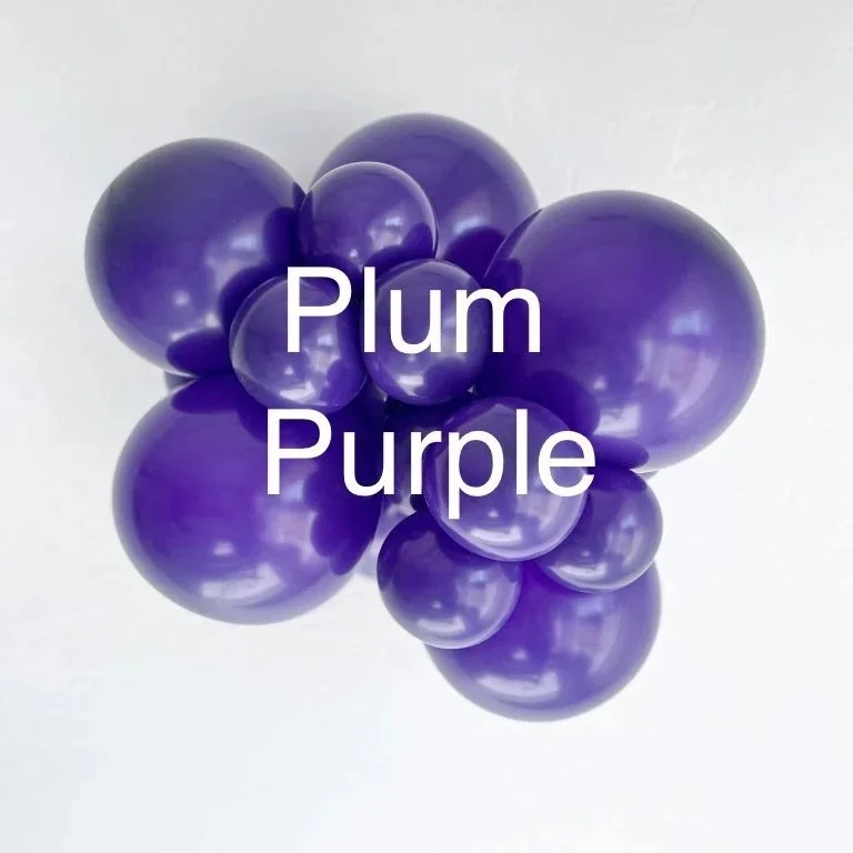A cluster of purple balloons with the words 'Plum Purple' written on top.