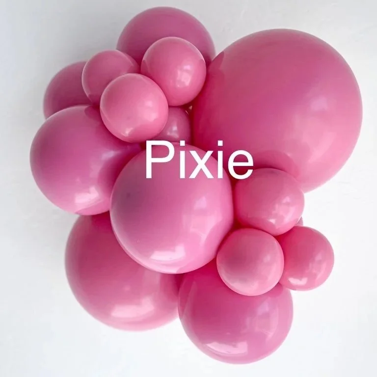 Arrangement of pink balloons of various sizes clustered together.