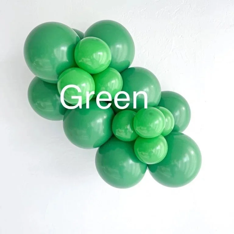 Cluster of green balloons against a white background with the word 'Green' superimposed.