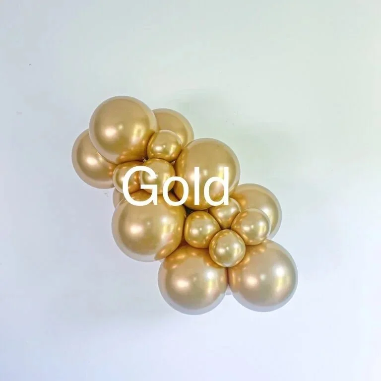 Cluster of gold-colored balloons against a plain background with the word "Gold" written across the center.