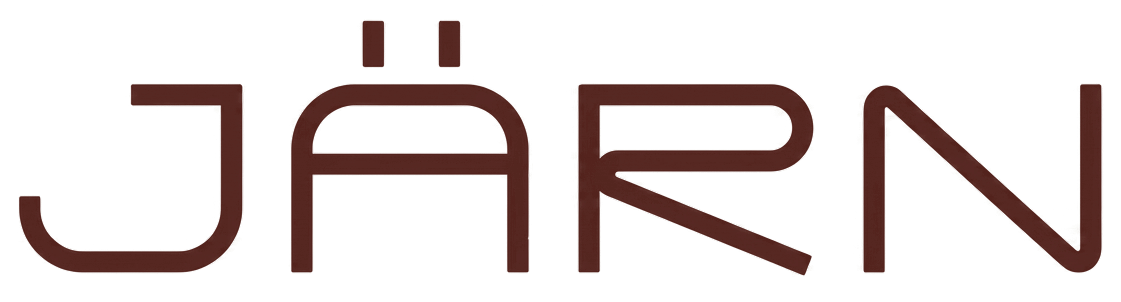 Text in stylized font spelling "JÁRN" on a black background.