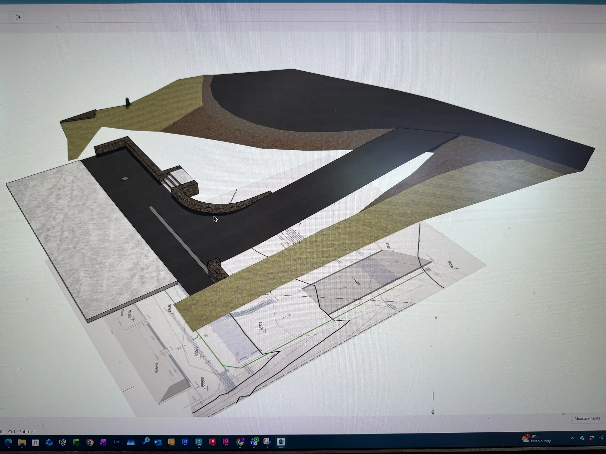 Computer screen displaying a 3D architectural model of a building and landscape design plans.