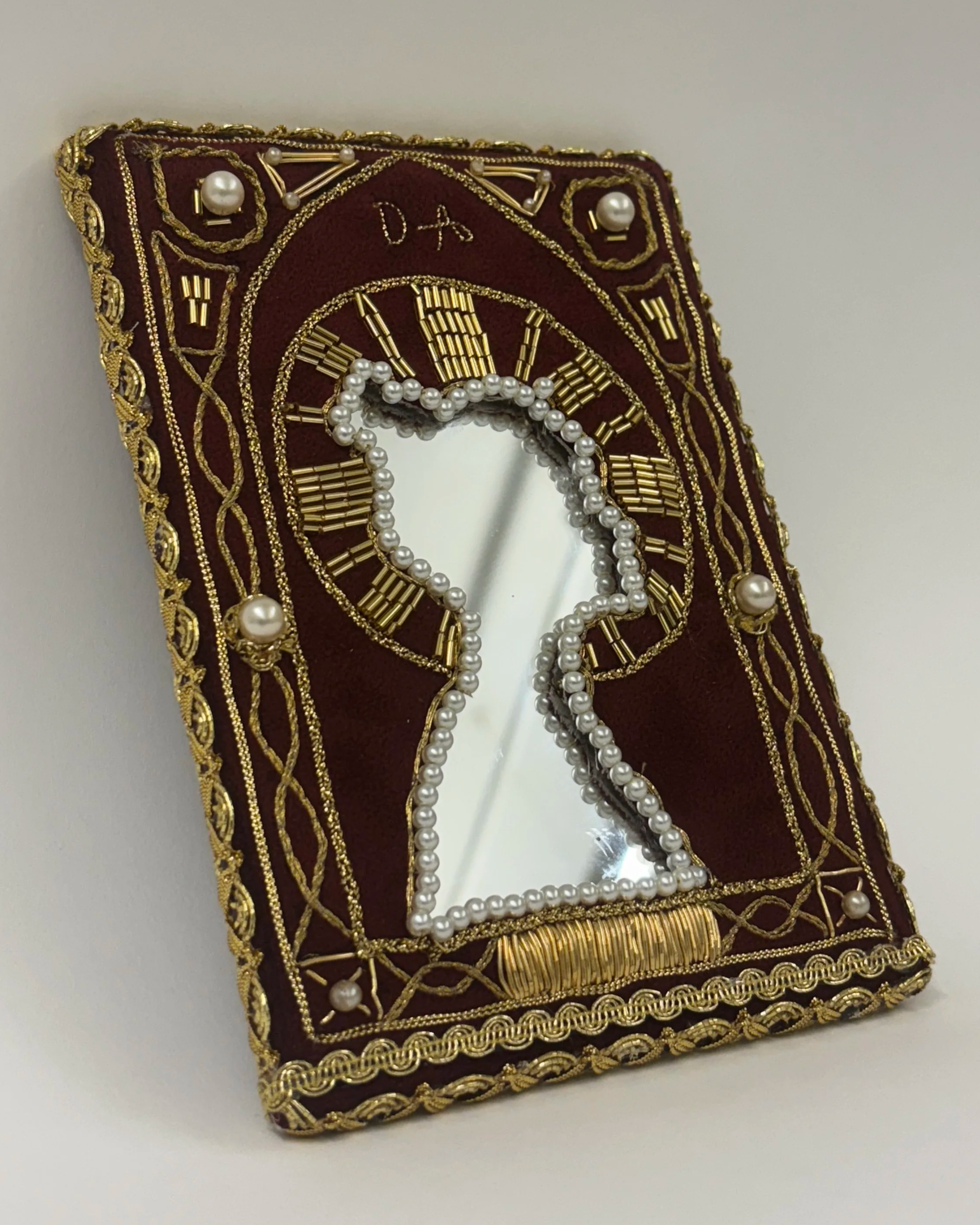 Alexis Fredericks, DEVOTION., embroidered textile icon inspired by Russian Orthodox devotional imagery, exploring cultural heritage, postmemory, adoption, and the search for belonging. Goldwork, beading.