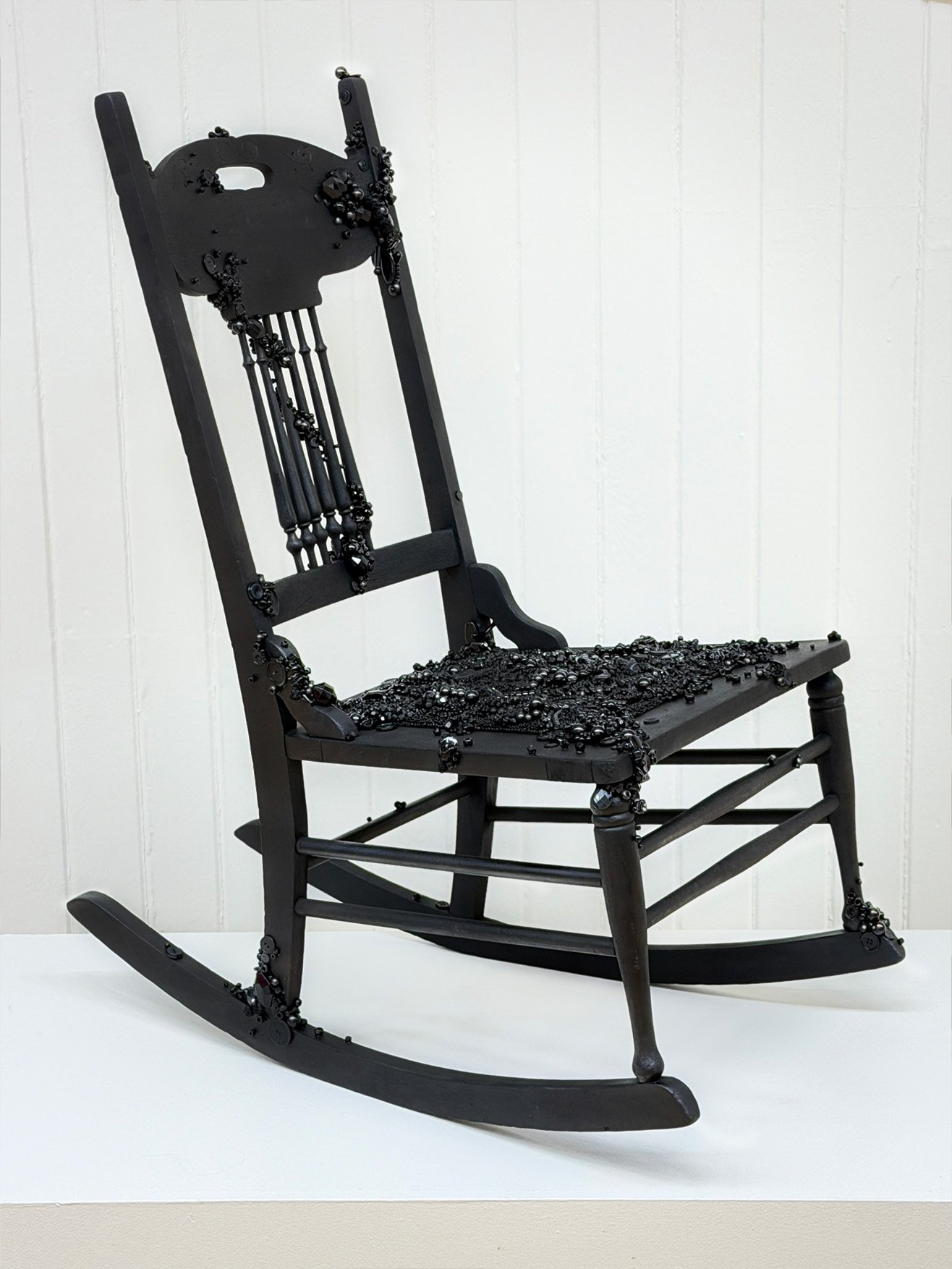 Alexis Fredericks, NO PLACE TO REST, tambour beaded rocking chair sculpture exploring lineage, inheritance, postmemory, and belonging.