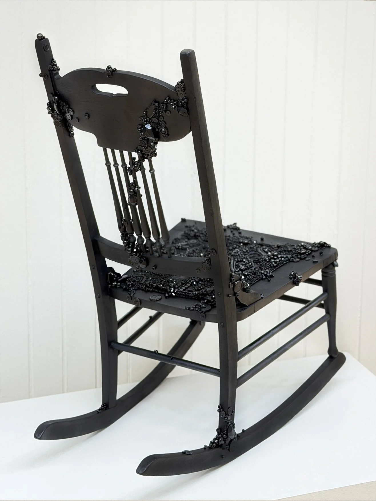 Alexis Fredericks, NO PLACE TO REST, tambour beaded rocking chair sculpture exploring lineage, inheritance, postmemory, and belonging.
