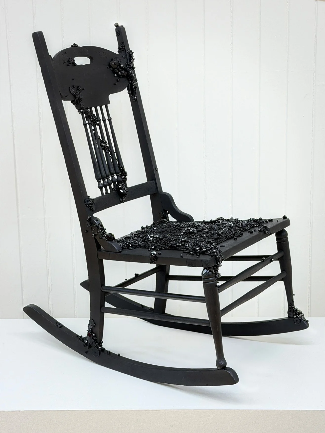 Alexis Fredericks, NO PLACE TO REST, tambour beaded rocking chair sculpture exploring lineage, inheritance, postmemory, and belonging.