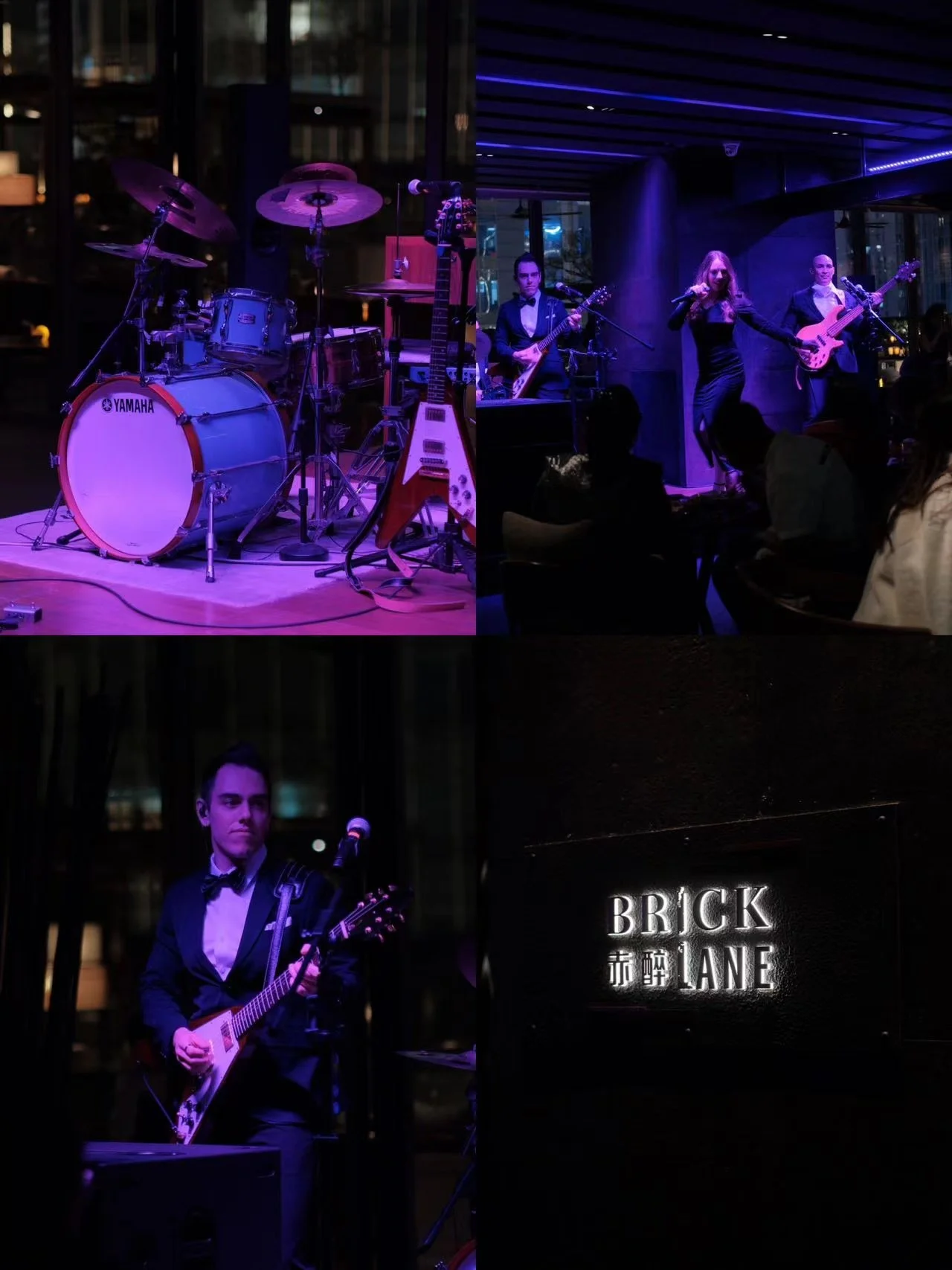 Photo of a band performing live at a venue called Brick Lane. The stage has a drum set, guitar, and bass, with musicians dressed in formal attire, and a backup singer. The scene is dimly lit with purple and blue lighting.