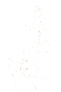 Golden confetti scattered in a spiral pattern on a black background.