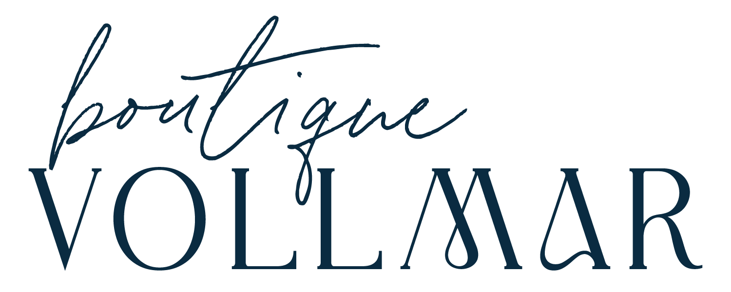 Handwritten style text that says 'boutique' above the bold text 'VOLLÄR' on a white background.