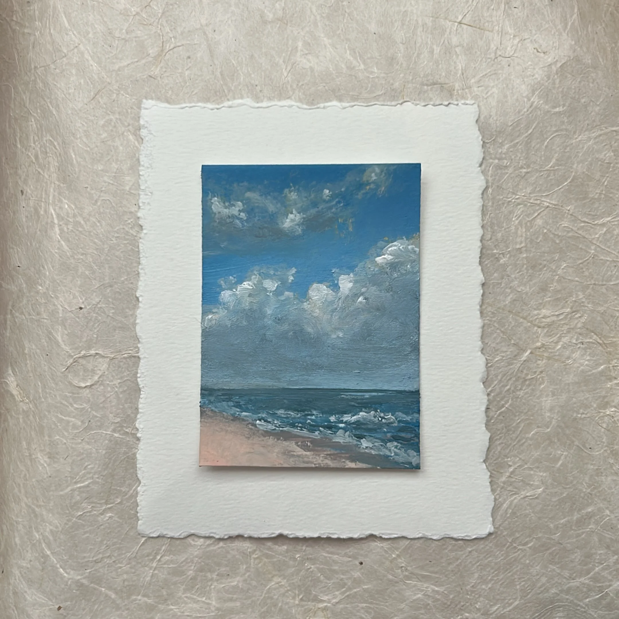 Turns out layering paper is just as fun as layering paint 🫣

I still love painting landscapes, oceans, and clouds in small doses. I made this mini beach scene a few weeks ago and have been playing around with an interesting way to elevate it. 

How 