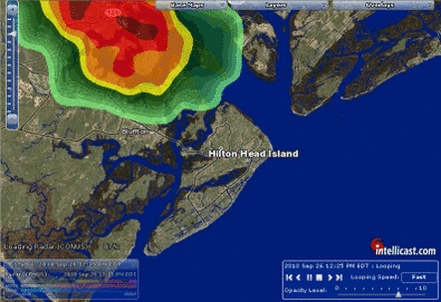 Weather radar map showing heavy storm activity near Hilton Head Island with intense red and orange colors, and surrounding green and yellow areas indicating lighter precipitation.