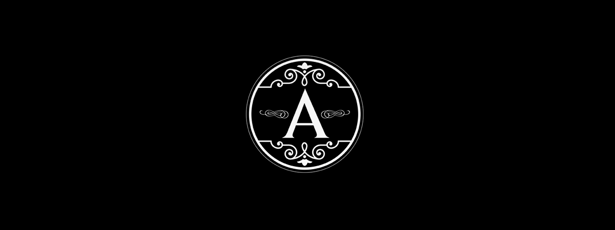 A black background with a white ornate circular emblem featuring the letter 'A' in the center.