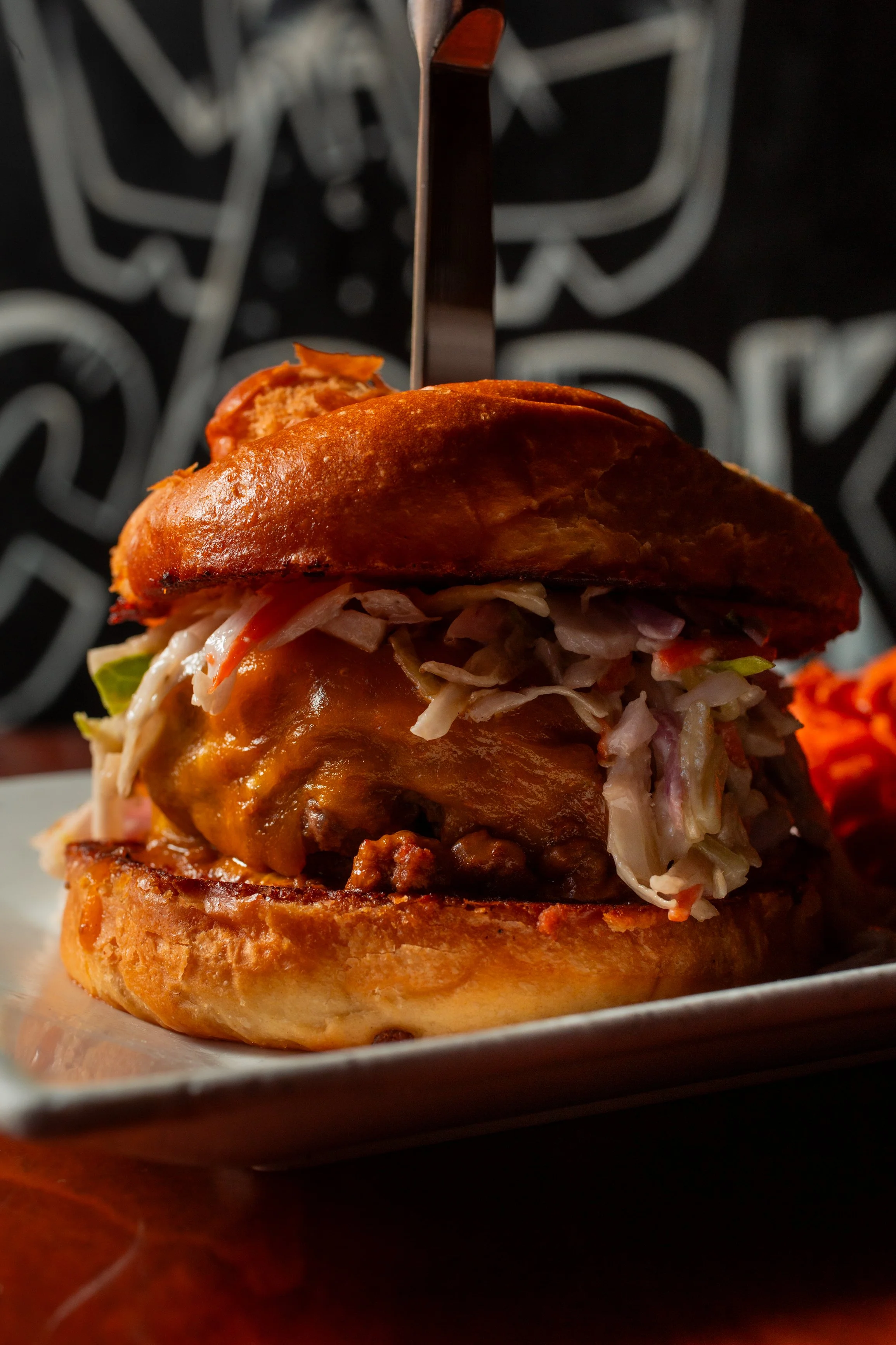 Fork n Cork features many burgers, including the classic Carolina. Located in downtown Wilmington.