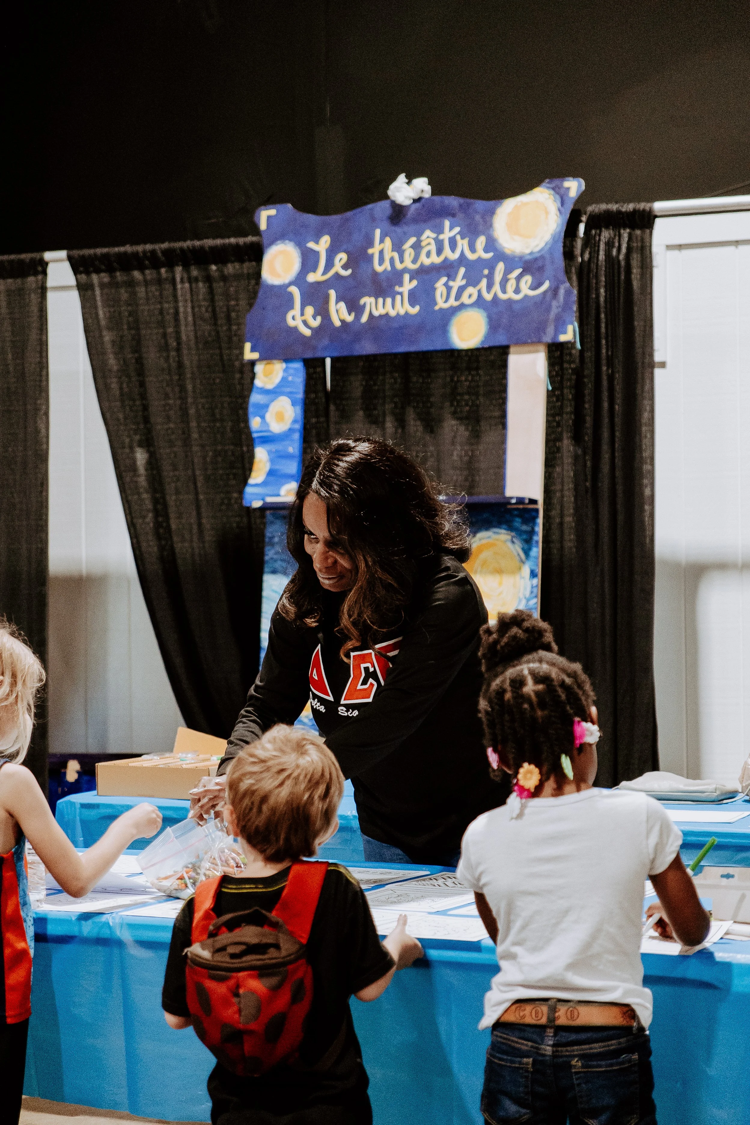 art lady helping kids (V).jpg