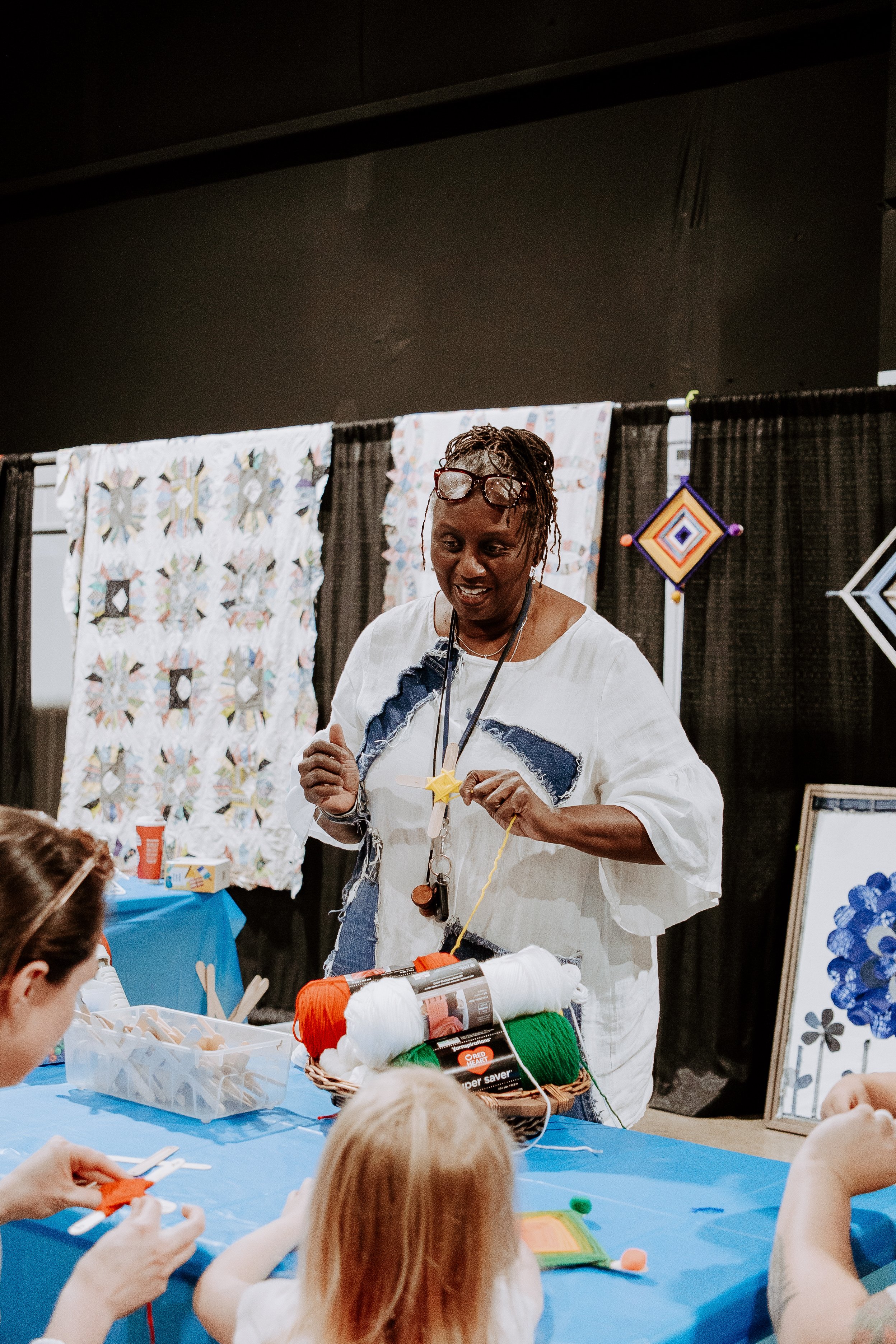 weaving lady talking to kid (V).jpg