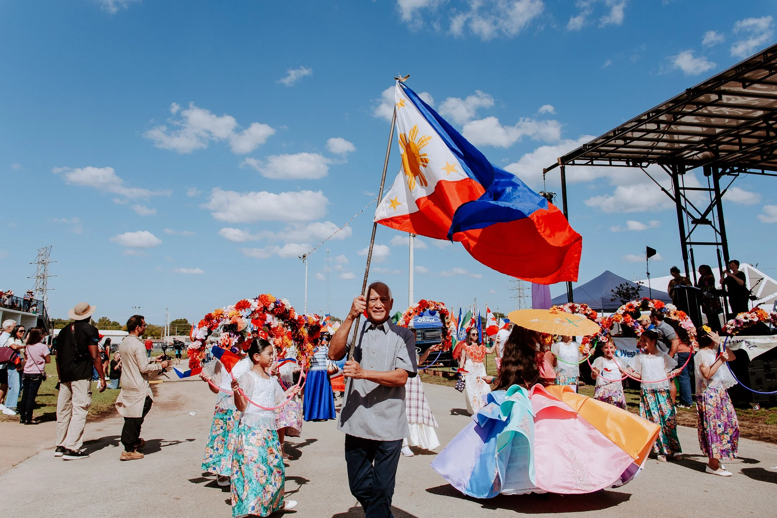 philippino man with flag and parade (H).jpg