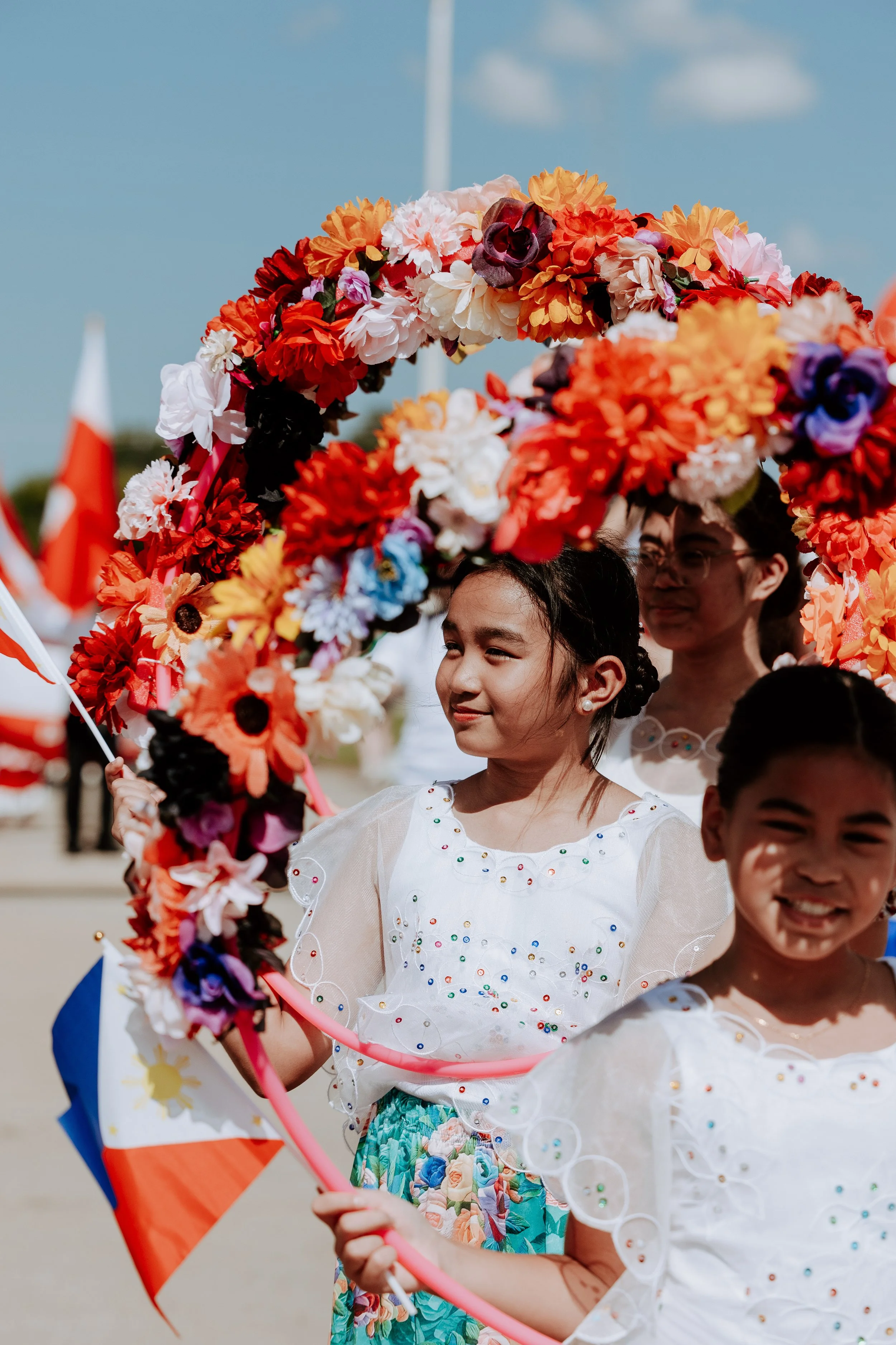 philippino girl with flowers in oarade (V).jpg