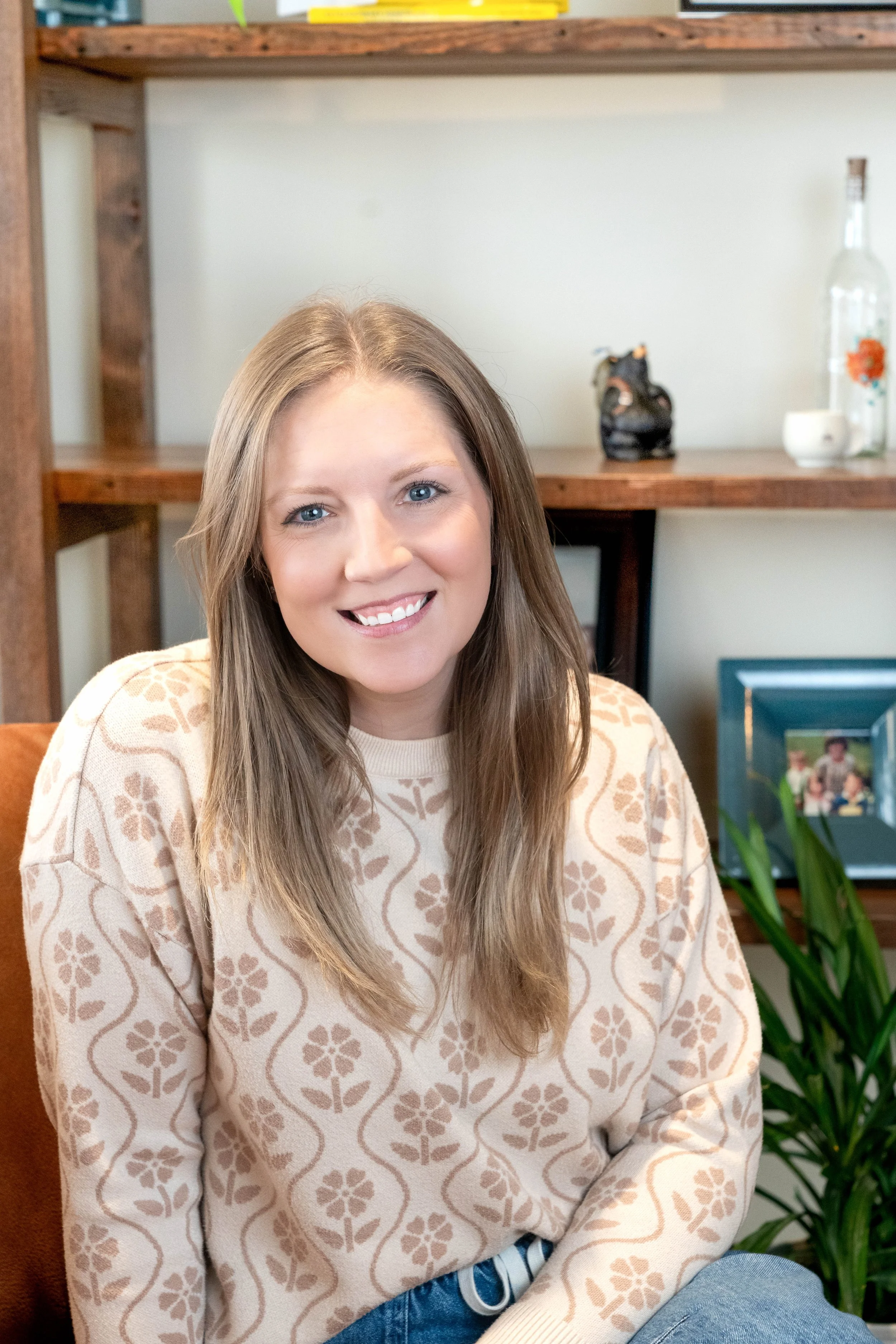 Rooted Fertility Co. co-founder, Ashlee Laroue, seated and smiling.