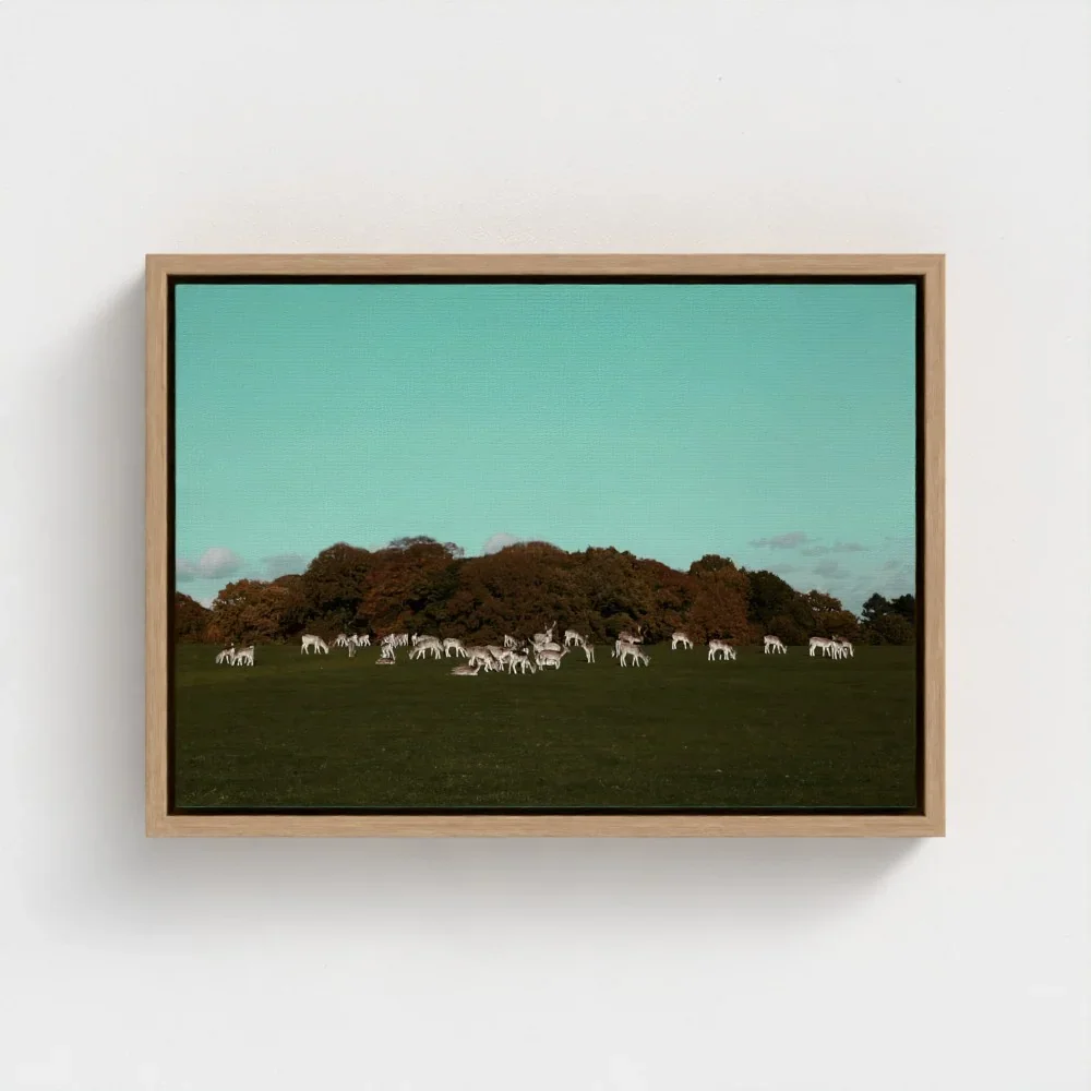 a-herd-of-deer-on-the-grassland- wood-frame-canvas-a3.webp