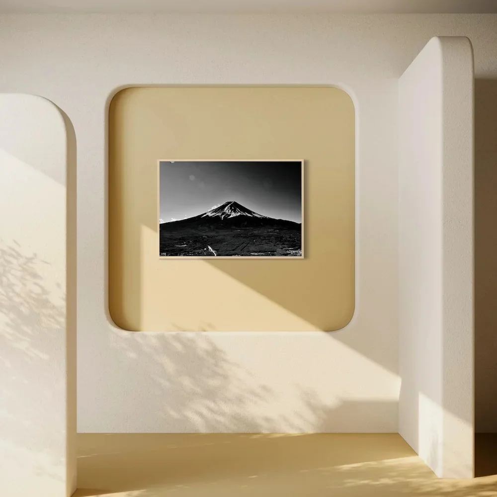 Black-and-white-mount-fuji-photo-on-wall.webp