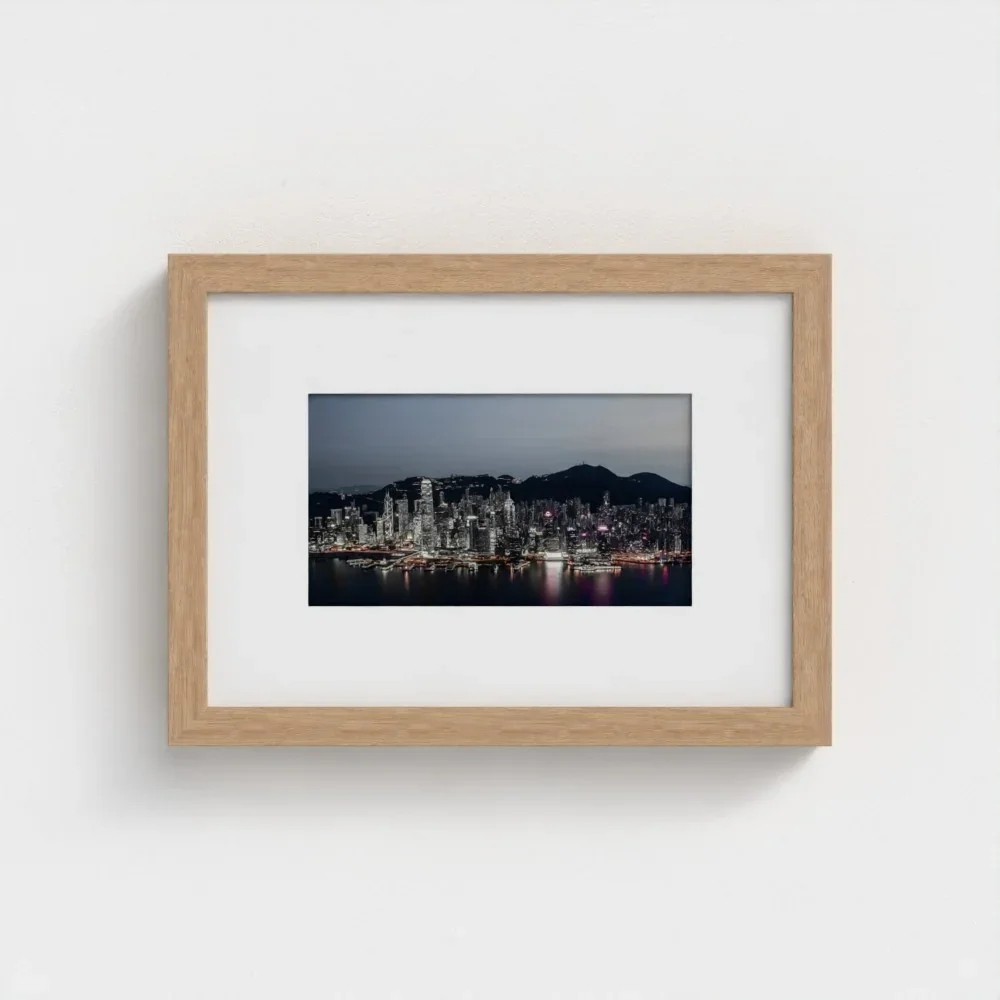 victoria-harbour-at-magic-hour-a4-wood-framed-mount-print.webp