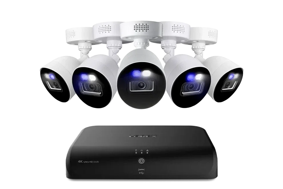 A security camera system with six white surveillance cameras and a black digital video recorder.